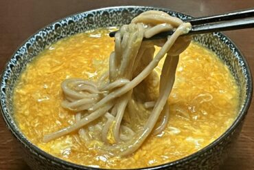 Keiran entangled in soba noodles